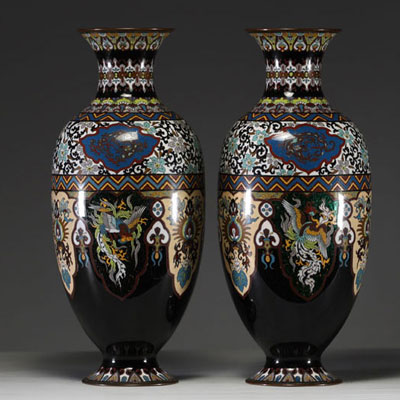 Japan - A pair of cloisonné vases with floral and phoenix decoration, Meiji period.