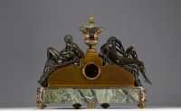 Imposing ormolu and patinated mantel clock decorated with antique figures, marble base, 19th century.