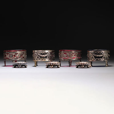 Set of four silver and three silver-plated metal salad bowls. 19th and 20th century.