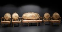 Important set of carved and gilded wood salon furniture, fine Aubusson tapestry including a sofa and a suite of four bergère armchairs, 19th century.