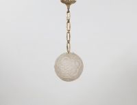J. ROBERT (XX) - Art Deco suspension lamp, stylized pressed moulded glass globe and nickel-plated brass chain, circa 1930.