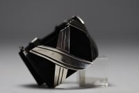 Hector AGUILAR attr. à - Modernist silver and nubuck bracelet.