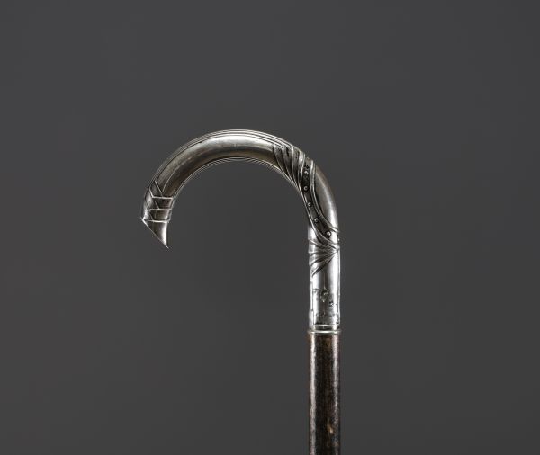 Cane with Art Deco motif in sterling silver, hallmark 800, Switzerland.