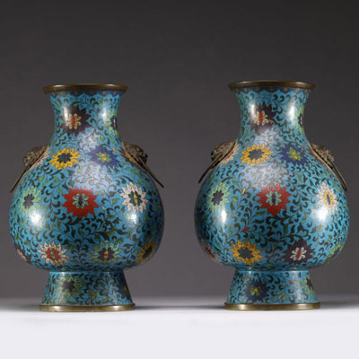 China - Pair of bronze vases in cloisonné enamel with lotus and foliage decoration, handles with taotie heads, Ming period.