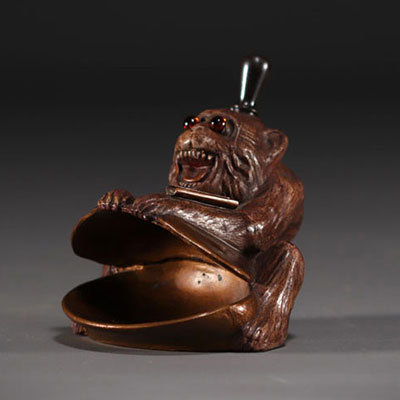 Bronze monkey with wick lighter, sulphide eyes, circa 1900.