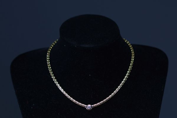 Necklace in 18k gold and brilliant-cut diamonds weighing 40g.