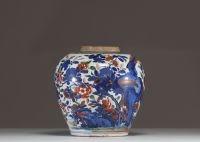 China - A polychrome porcelain vase decorated with flowers, trees and birds, 17th century.