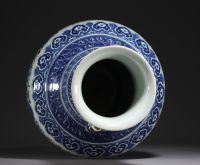 China - Large Hu-shaped vase in blue-white porcelain with floral decoration and bamboo handles, 19th century