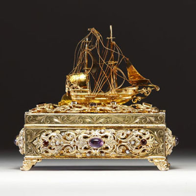 Silver and vermeil jewellery box, lid surmounted by a galleon, inlaid with cabochon semi-precious stones and pearls around the rim, Austria, 18th-19th century.