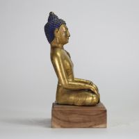 CHINE, DYNASTIE QING, XIXe SIÈCLE Bouddha assis en méditation Bronze doré.