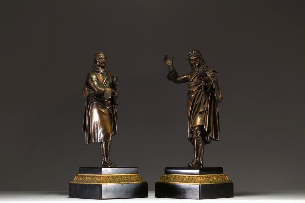‘Molière and Corneille’ Pair of bronze sculptures with brown patine on black marble base and gilded bonze, 19th century.