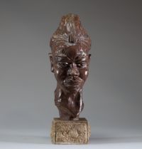 Paul SERSTÉ (1910-2000) - Tête africaniste, sculpture en terre cuite patinée sur socle en marbre, signée.