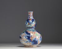Chine - Vase double gourdes à décor de paysages montagneux et personnages.