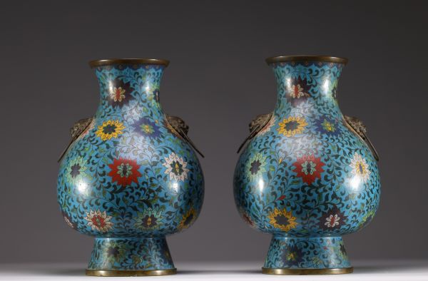 China - Pair of bronze vases in cloisonné enamel with lotus and foliage decoration, handles with taotie heads, Ming period.