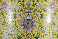 China - Imposing pink family polychrome porcelain vase with floral decoration on a yellow background, handles depicting dragons, 20th century.