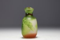 Émile GALLÉ (1846-1904) Acid-etched multi-layered glass gourd vase decorated with oak leaves and acorns.