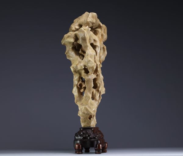 China - ‘Dream Stone’ sculpture, hard stone on wooden base, 19th century.