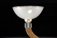 Paire d'appliques en verre de Murano sur monture en laiton doré et argenté.