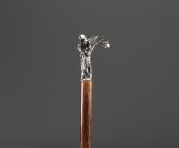 Cane with an Art Nouveau motif, shaft in fine wood, solid silver knob decorated with a woman in bloom.