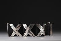 Hector AGUILAR (attribué à) - Bracelet moderniste en argent et cuir.