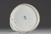 China - A blue-white porcelain vase decorated with dragons, Qing mark under the piece, 19th century.