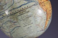 J. Forest, Paris - Globe, black turned wood base, circa 1908.
