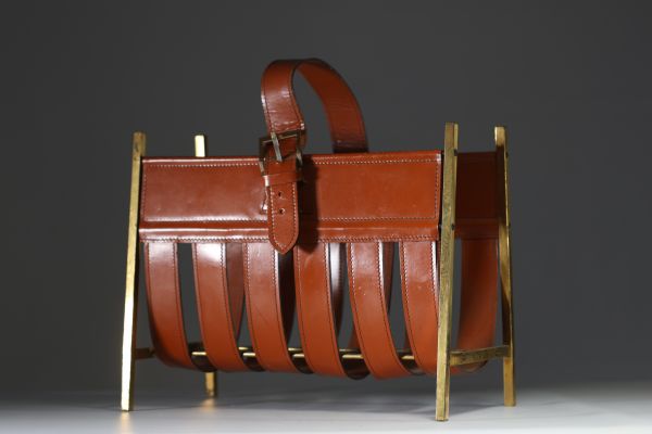 Jacques ADNET (1900-1984) Brass and orange leather magazine rack, circa 1940.