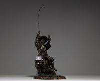 Japan - ‘The fisherman’ Bronze sculpture with brown patina, monogrammed on the back, late 19th century.