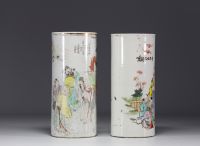 China - Set consisting of a pair of porcelain brush holders and a covered pot, 20th century.
