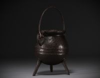 17th century cast iron tripod hearth cauldron.