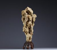 China - ‘Dream Stone’ sculpture, hard stone on wooden base, 19th century.