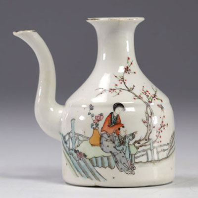 China - Famille rose porcelain teapot decorated with characters.