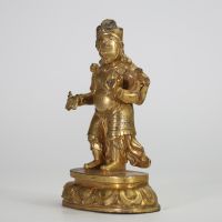 TIBET, XIXe SIÈCLE Roi gardien (Dharmapala) Bronze doré.