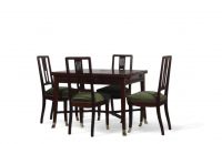 Set of four Art Nouveau mahogany chairs and table, Austria, circa 1910.