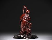 China - Wooden sculpture representing Shou Lao and a child, circa 1900.