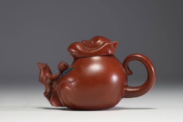 China - Yixing clay teapot in the shape of a monkey, debossed mark on the underside.