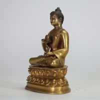 Bouddha assis en dhyanasana Tibet, XXe siècle Bronze doré.