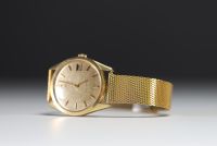 Certina - Blue Ribbon, automatic men's watch in 18k gold, circa 1960.
