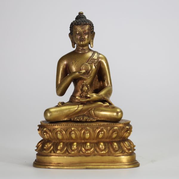 Bouddha assis en dhyanasana Tibet, XXe siècle Bronze doré.