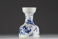 China - A blue-white porcelain vase decorated with dragons, Qing mark under the piece, 19th century.