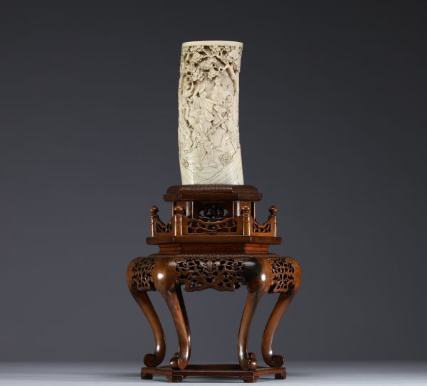 Japan - Carved ivory vase on a wooden base Meiji period circa 1900.