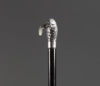 Art Nouveau silver cane with Ibis head motif, glass eyes, hallmark 800.