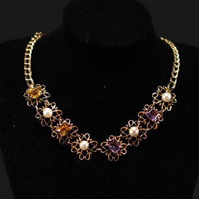 Necklace in 18k yellow gold, amethyst, octagon-cut yellow sapphire and natural pearls.