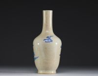 China - A 19th century Nanking porcelain vase decorated with Fô dogs on a crackled background.