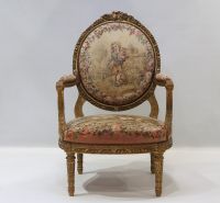 Important set of carved and gilded wood salon furniture, fine Aubusson tapestry including a sofa and a suite of four bergère armchairs, 19th century.