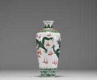 China - A 19th century green family polychrome porcelain vase decorated with a dragon.