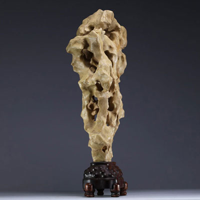 China - ‘Dream Stone’ sculpture, hard stone on wooden base, 19th century.
