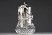 W. A. BOLIN - Moscow, 1891 - Sumptuous carafe in cut crystal and solid silver decorated with vines in relief, stamped Bolin, hallmarks KL and 84 zolotnik.