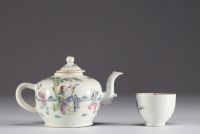 China - A famille rose porcelain teapot and bowl decorated with figures, 19th century.
