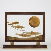 Pendulette Hermès Paris, attribuée à Jean Pascaud, vers 1940 Bois de palissandre, laiton doré, verre gravé